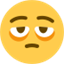 Émoji face with bags under eyes