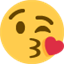 Émoji face throwing a kiss